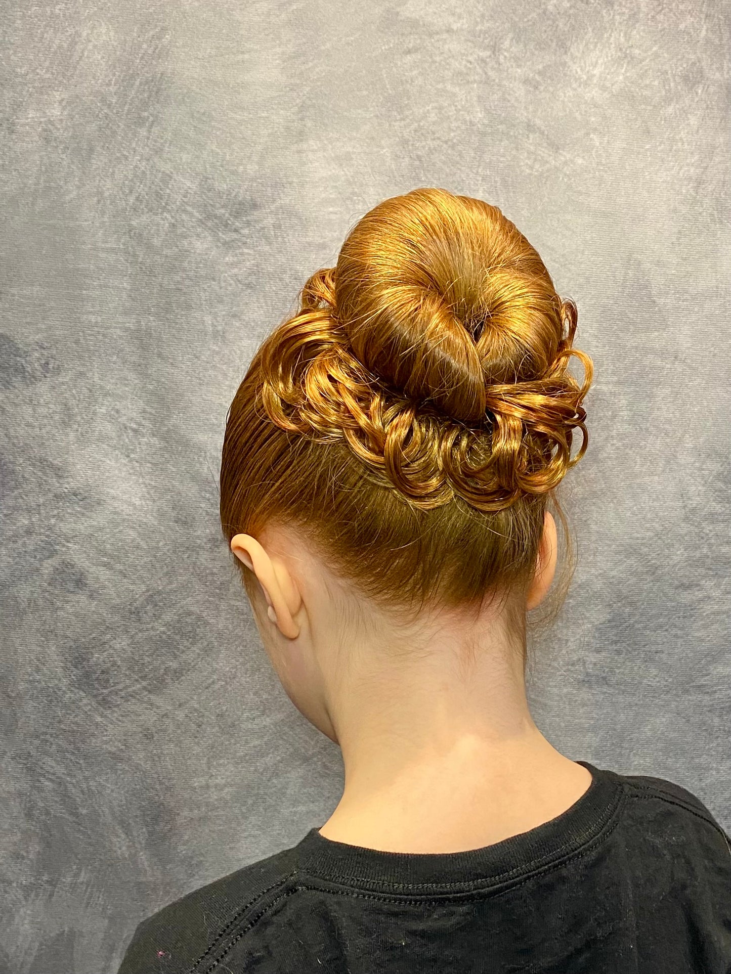 Dancer Hairdos Bun of Curls